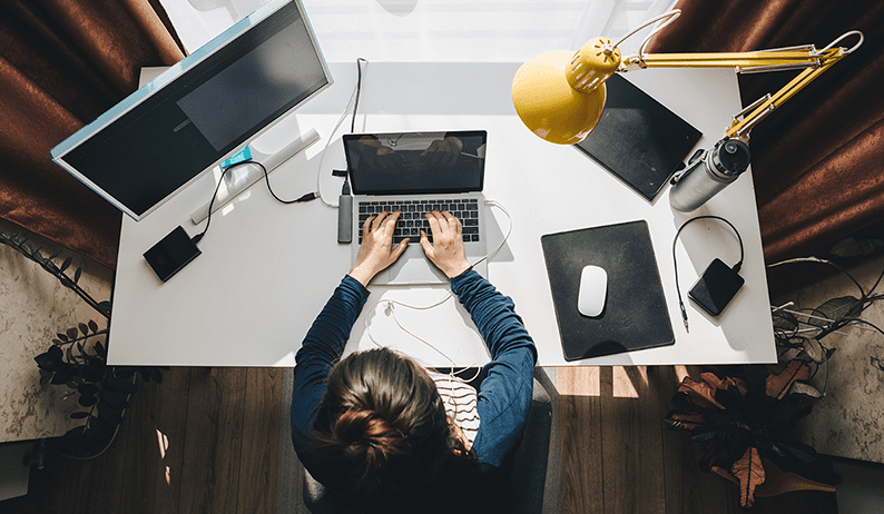 overhead shot of woman working remotely