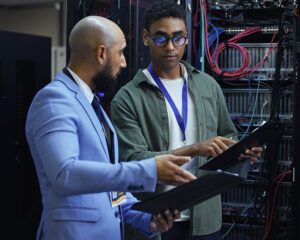 IT support agents working in server room