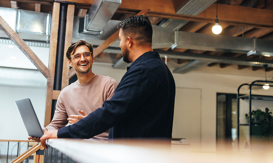 Two guys in tech meeting